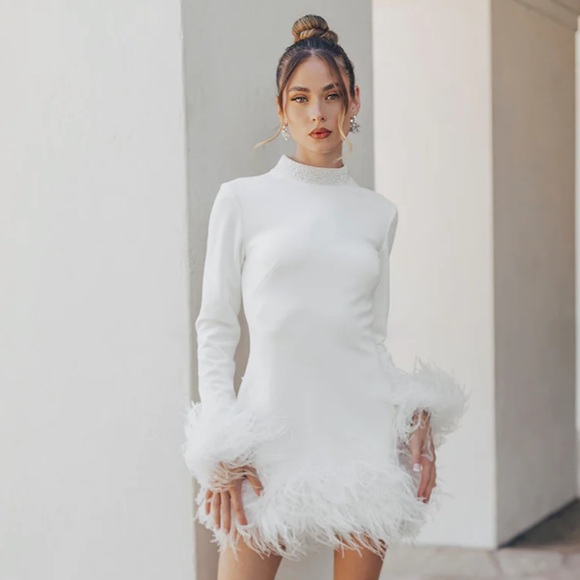 White mini dress with fur trimming from Untamed Petals. - Picture 3 of 6